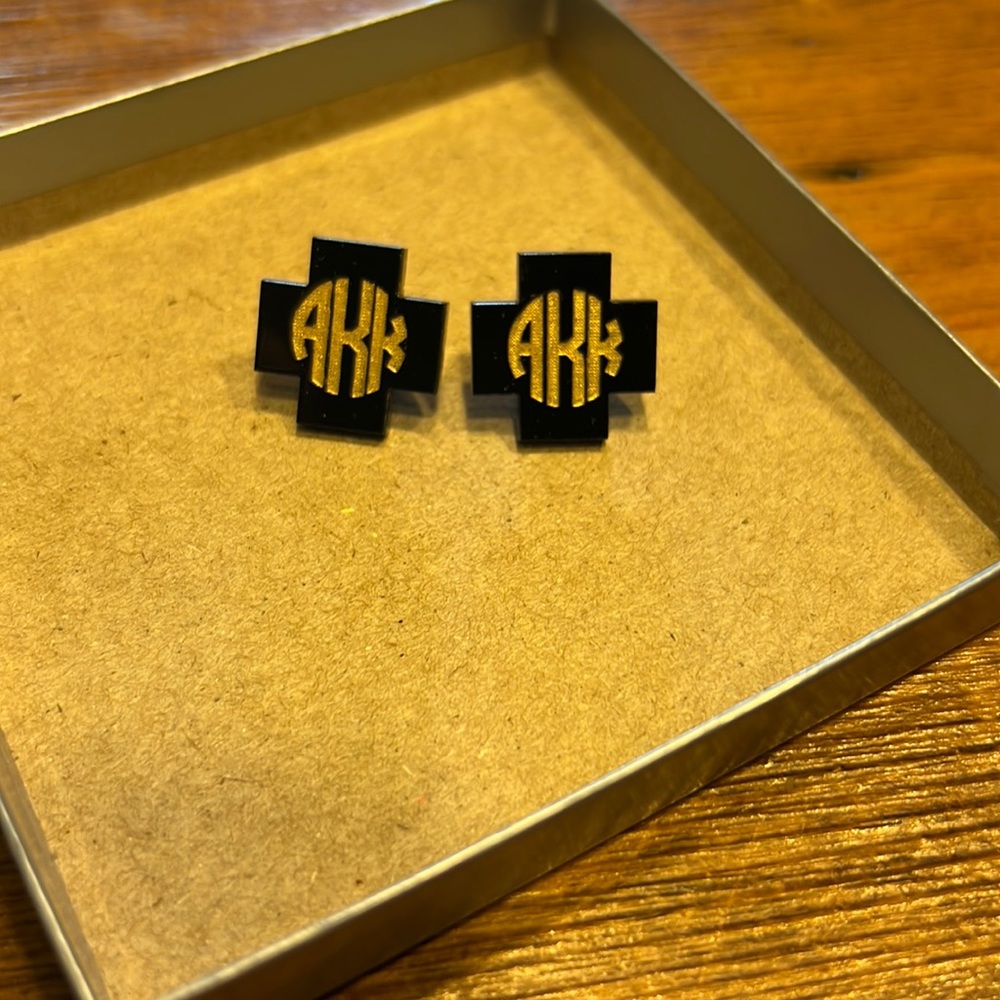 Monogram AKK black stud earrings